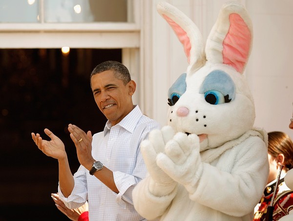 WASHINGTON, DC - APRIL 09:  U.S. President Barack Obama stands with a person in an Easter rabbit costume during the annual Easter Egg Roll on the South Lawn of the White House April 9, 2012 in Washington, DC. Thousands of people are expected to attend the 134-year-old tradition of rolling colored eggs down the White House lawn that was started by President Rutherford B. Hayes in 1878.  (Photo by Chip Somodevilla/Getty Images)