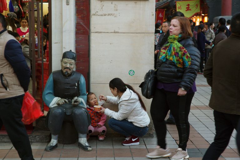 China's official Xinhua News Agency says China's ruling Communist Party has decided to abolish the country's one-child policy and allow all couples to have two children. (AP Photo/Ng Han Guan)