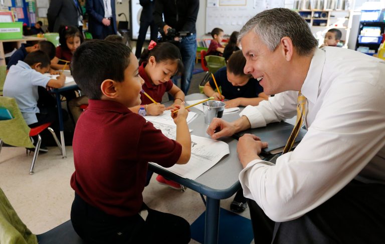 Education Secretary Arne Duncan visits with young students.Â The House late Wednesday passed a legislative rewrite of the unpopular 