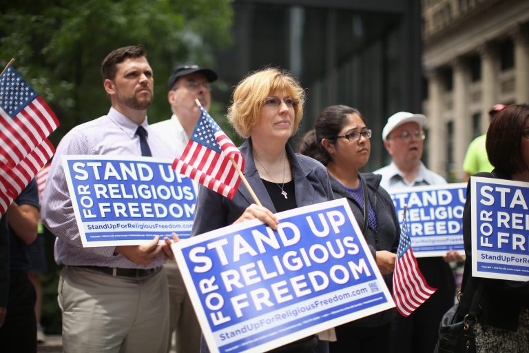 Religious freedom supporters hold a rally to praise the Supreme Court's 5-4 decision in the Hobby Lobby case, June 30, 2014 in Chicago, Illinois. Â (Photo by Scott Olson/Getty Images)
