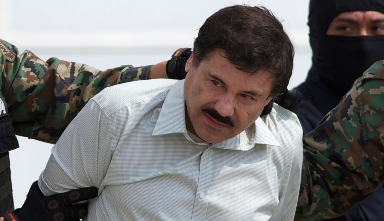 FILE - This Feb. 22, 2014 file photo shows Joaquin "El Chapo" Guzman, the head of Mexicoâs Sinaloa Cartel, being escorted to a helicopter in Mexico City following his capture overnight in the beach resort town of Mazatlan. Ten years after it began, Mexicoâs drug war has left some major drug cartels splintered and many of the old-line capos in jail, but it has done little to reduce the amount of crime or violence in Mexicoâs roughest regions.