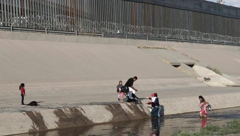 Migrant families cross the rio Grande to get illegally across the border into the United States, to turn themselves in to authorities and ask for asylum, next to the Paso del Norte international bridge, near El Paso, Texas, Friday, May 31, 2019. The Border Patrol said it has encountered more than 180 groups of over 100 people since October, compared with 13 in the previous 12-month period and two the year before. 