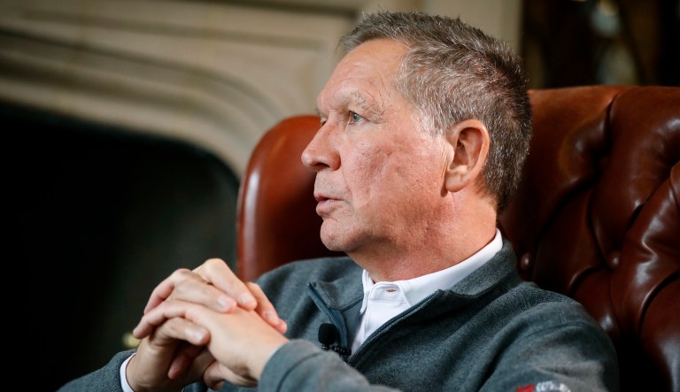 Ohio Gov. John Kasich sits for an interview with the Associated Press at the Ohio Governor's Residence and Heritage Garden, Thursday, Dec. 13, 2018, in Columbus.