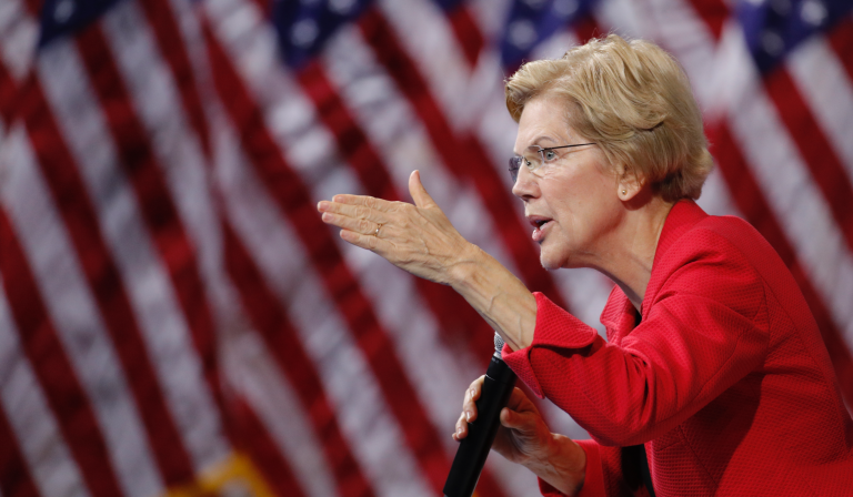 FILE - In this Oct. 2, 2019 file photo, Democratic presidential candidate Sen. Elizabeth Warren, D-Mass., speaks during a gun safety forum in Las Vegas. Warren has invoked Matthew 25âs verses about âthe least of theseâ more than a half-dozen times in public forums since her campaign started, including at a New Hampshire town hall when she urged a less draconian immigration policy. (AP Photo/John Locher, File)
