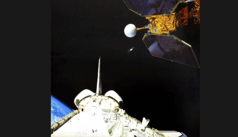 In this photo made available by NASA, the space shuttle Challenger launches the Earth Radiation Budget Satellite in 1984. On Friday, Jan. 6, 2023, the U.S. space agency said the 38-year-old NASA satellite is about to fall from the sky, but the chance of wreckage falling on anybody is âvery low.â It's expected to come down Sunday night, give or take 17 hours. 