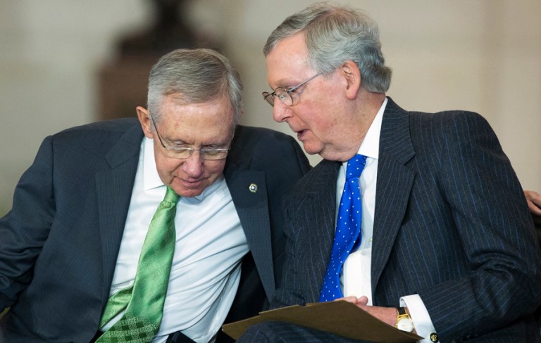 Senate Minority Leader Harry Reid and Senate Majority Leader Mitch McConnell both touted a bill by Sens. Lisa Murkowski and Maria Cantwell as a good chance for bipartisan energy reform. (AP file photo/Evan Vucci)