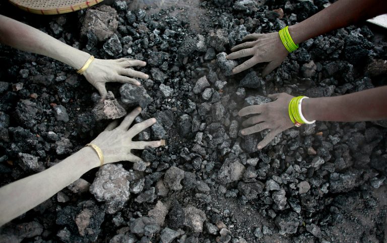 India's increased use of coal could offset gains in greenhouse gas emission reductions, energy agency says. (AP Photo/ Anupam Nath)