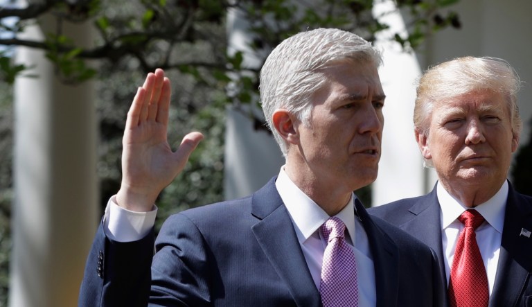 Supreme Court Justice Anthony Kennedy administered the judicial oath to Justice Neil Gorsuch, nominated by President Trump and approved by a GOP-controlled Senate, on April 10. (AP Photo/Evan Vucci, File)
