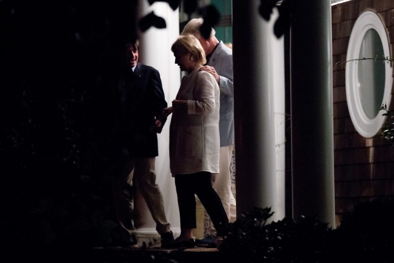 Democratic presidential candidate Hillary Clinton, second from left, and former President Bill Clinton, right, leave a fundraiser at Snyder's home in East Hampton, N.Y., Monday, Aug. 29, 2016. (AP Photo/Andrew Harnik)