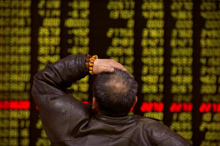 Community banks complain that they have had to hire more compliance officers than loan officers. (AP Photo/Mark Schiefelbein)