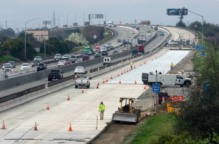 Under the nine-month pilot, set to start in July, 5,000 California volunteers will report and simulate payment for the amount of miles they travel. (AP Photo)