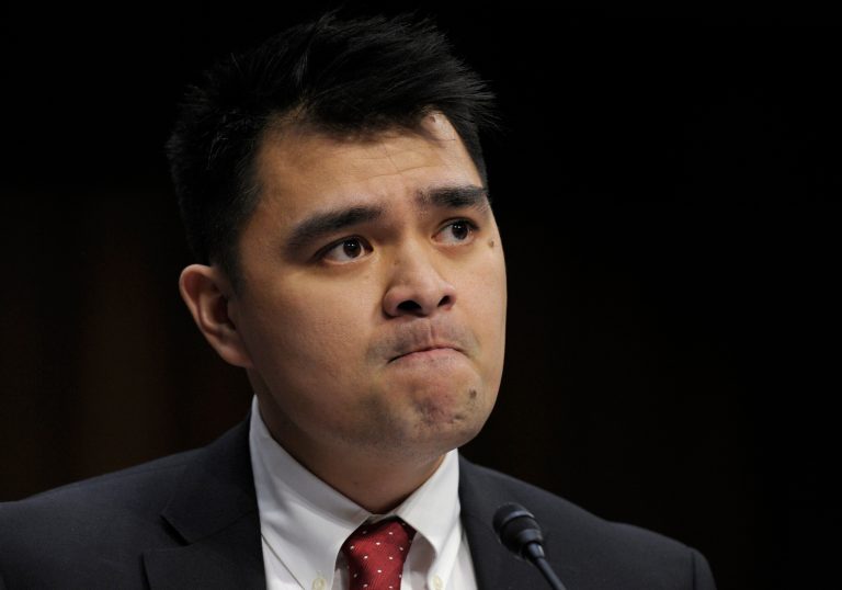 FILE - In this Feb. 13, 2013 file photo, Pulitzer Prize-winning journalist, immigration rights activist and self-declared undocumented immigrant Jose Antonio Vargas becomes emotional as he testifies about comprehensive immigration reform during a hearing of the Senate Judiciary Committee on Capitol Hill in Washington. An autobiographical documentary by one of America's best known illegal immigrants has opened an independent film festival in his home country, the Philippines, to applause, laughter and tears. Vargas' mother received a certificate of recognition on his behalf at the 10th Cinemalaya film festival in Manila on Friday night, Aug. 1, 2014. (AP Photo/Susan Walsh, File)