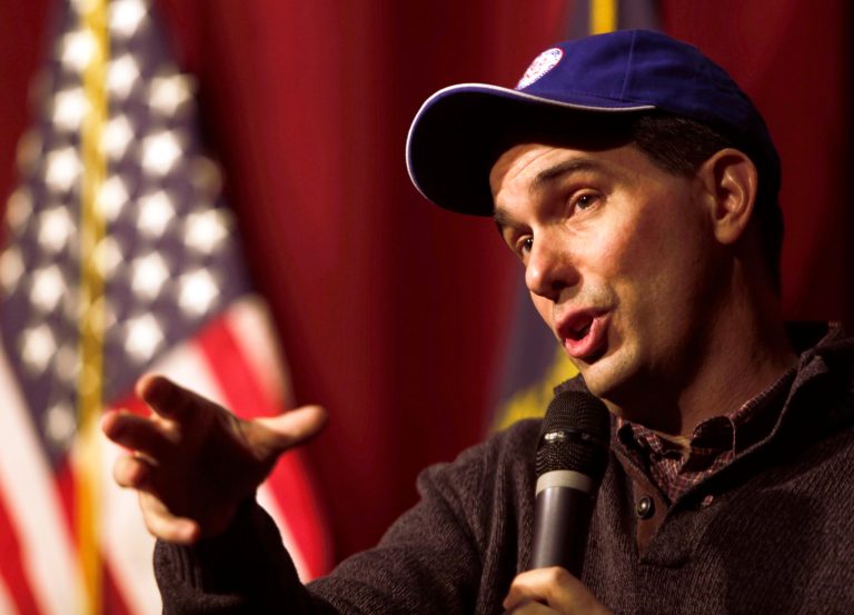 Wisconsin Gov. Scott Walker answers questions at a training workshop for the state Republican Party in the auditorium at Concord High School Saturday, March 14, 2015, in Concord, N.H. (AP Photo/Jim Cole)