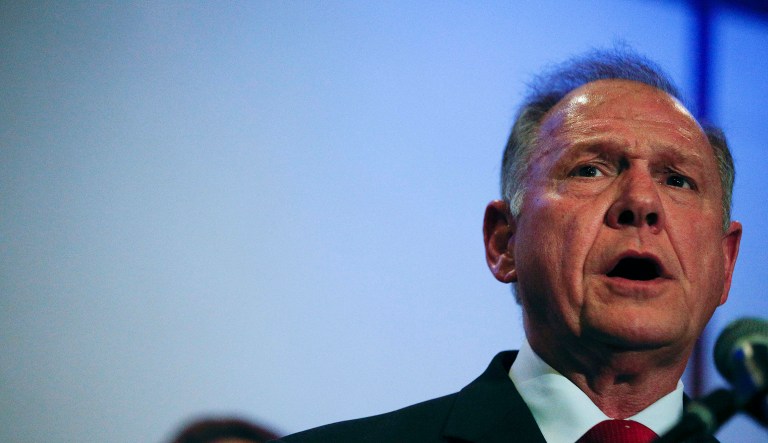 Video footage obtained by Connor Sheets, a statewide investigative reporter for outlets including the Birmingham News, shows the one man pushing another man holding a camera outside a campaign rally in Henagar Park in Fort Payne, Ala. (AP Photo/Brynn Anderson)