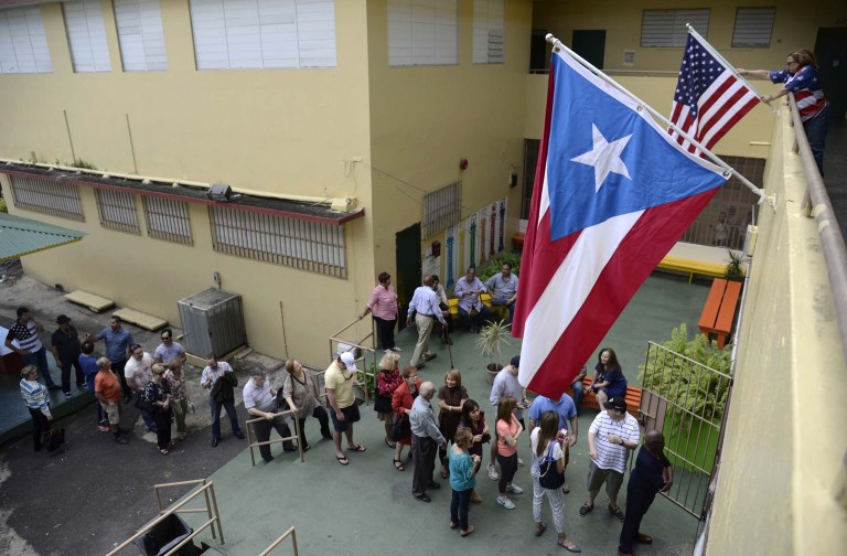 Congress can provide a helping hand to Puerto Rico. But ultimately the current financial troubles that plague the island can be solved only in San Juan. (AP Photo/Carlos Giusti)