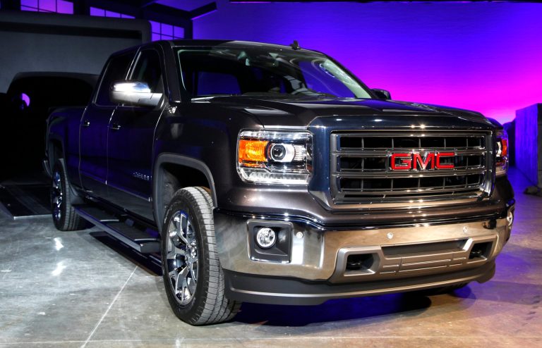   The 2014 GMC Sierra debuts in Pontiac, Mich., Thursday, Dec. 13, 2012. General Motors unveiled a new versions of its top-selling Chevrolet Silverado and GMC Sierra on Thursday Dec. 13, 2012. The 2014 models will go on sale by early spring or late summer. The models roll into a market where truck sales are growing after a five-year slump. (AP Photo/Paul Sancya)  
