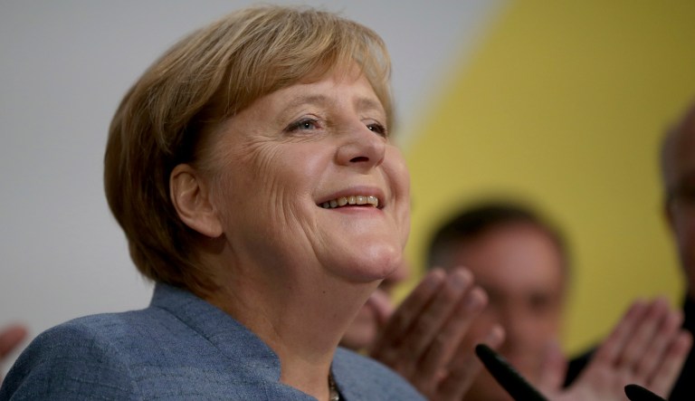 German elections on Sunday was portrayed as an inevitable and well-deserved triumph for German Chancellor Angela Merkel. (Joerg Carstensen/dpa via AP)