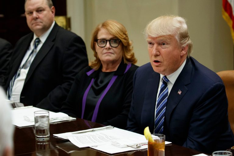 Sen. Jon Tester, D-Mont., left, and Sen. Heidi Heitkamp, D-N.D., center, listen as President Donald Trump speaks during a meeting with Senators on his Supreme Court Justice nominee Neil Gorsuch, Thursday, Feb. 9, 2017, in the Roosevelt Room of the White House in Washington. (AP Photo/Evan Vucci)