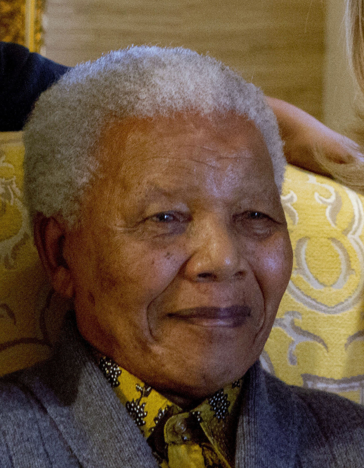 Mandela remains hospitalized as questions grow