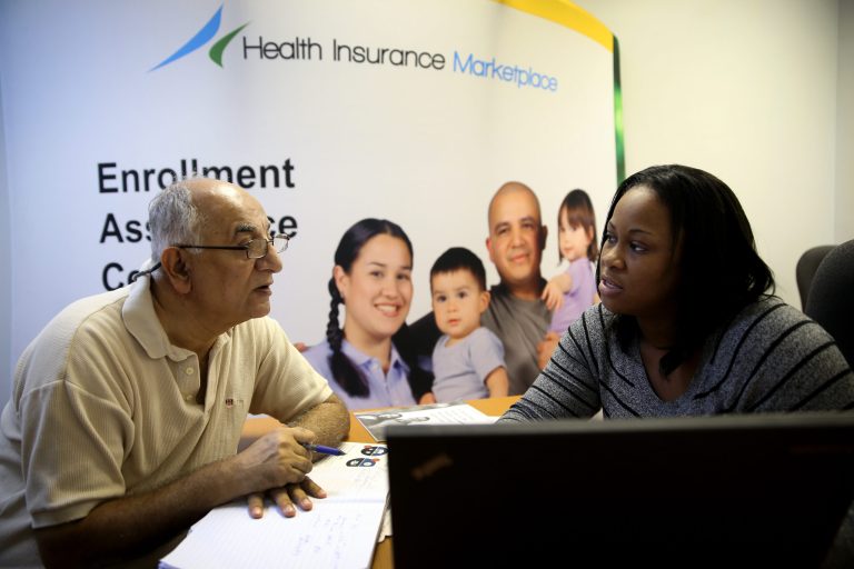 An individual finishes the process of picking and signing up for health insurance through the Affordable Care act. (Joe Raedle/Getty Images)