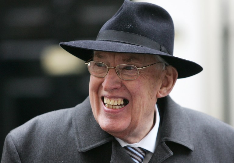 FILE - In this Thursday, March 22, 2007, file photo Rev. Ian Paisley, Leader of the Democratic Union Party, smiles as he speaks to the press as he leaves 11 Downing Street after a meeting on the Northern Ireland budget with British Chancellor Gordon Brown, London. Paisley the fiery Protestant leader has died in Northern Ireland aged 88  his wife Eileen said Friday Sept. 12, 2014. Much like the Ulster weather, Ian Paisley could offer beaming sunshine one minute, stinging hailstones the next. The international image of Paisley _ that of Northern Ireland's most dangerous demagogue, a belligerent bigot committed to keeping Irish Catholics at bay and out of power _ was well-documented in its own right. But understanding the worst of the public Paisley wouldn't prepare you for meeting him in the flesh.   (AP Photo/Sang Tan, File)