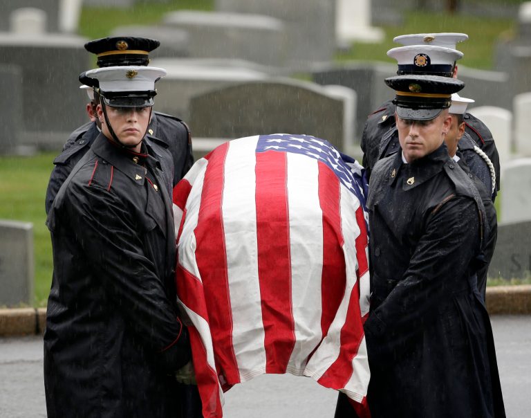 The flag draped casket of the late New Jersey Sen. Frank Lautenberg is carried by members of the Joint Military Casket Team during burial services at Arlington National in Arlington, Va., Friday, June 7. (AP Photo/Pablo Martinez Monsivais)