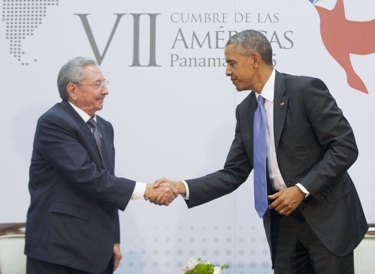 President Obama and Cuban President Raul Castro shake hands during their meeting at the Summit of the Americas in Panama City, Panama, Saturday, April 11, 2015. (AP Photo/Pablo Martinez Monsivais)