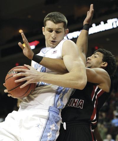 Julie Jacobson/AP
Forward Tyler Zeller and North Carolina will face No. 9 Wisconsin and No. 1 Kentucky this week.