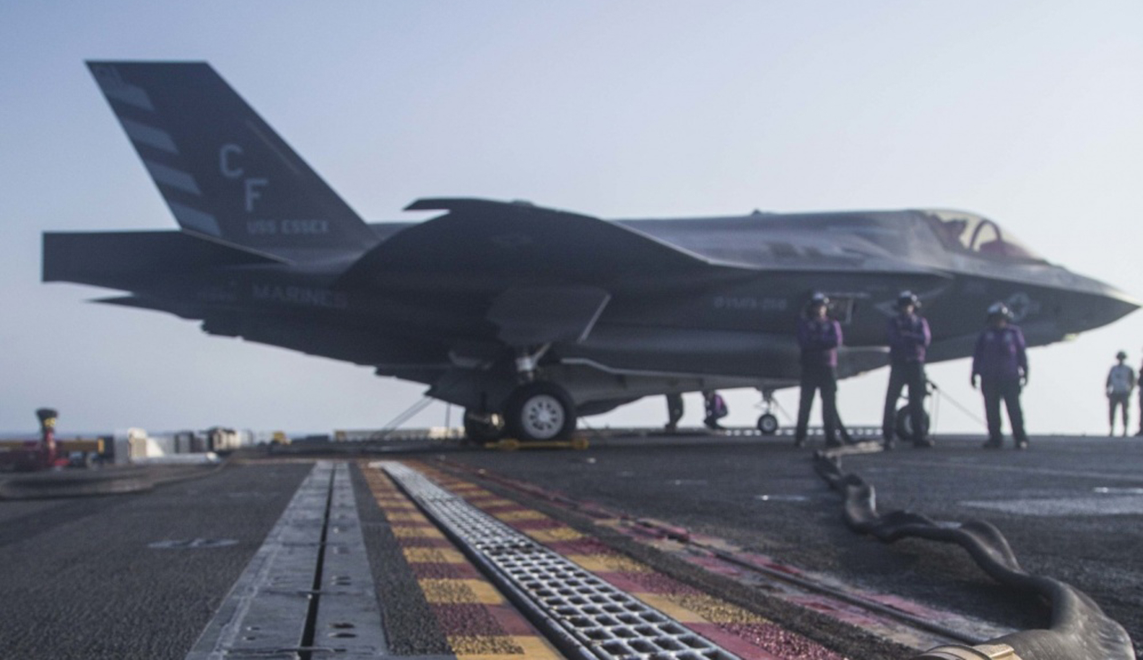 U.S. Sailors with the Essex Amphibious Ready Group refuel an F-35B Lightning II with Marine Fighter Attack Squadron 211, 13th Marine Expeditionary Unit, aboard the Wasp-class amphibious assault ship USS Essex in preparation for the F-35B's first combat strike on Thursday.