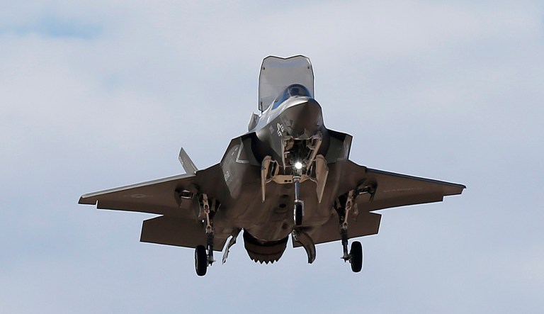 An F-35B fighter jet, the U.S. Marine Corps variant of the F-35 from the Marine Corps Air Station in Yuma, Ariz., flies into Luke Air Force Base Tuesday, Dec. 10, 2013, in Goodyear, Ariz. The new jet shows off its abilities at the request of senior defense officials from Singapore, who are visiting Luke AFB as part of Forging Sabre, a Singapore armed forces exercise taking place at Luke and at the Barry M. Goldwater training range.