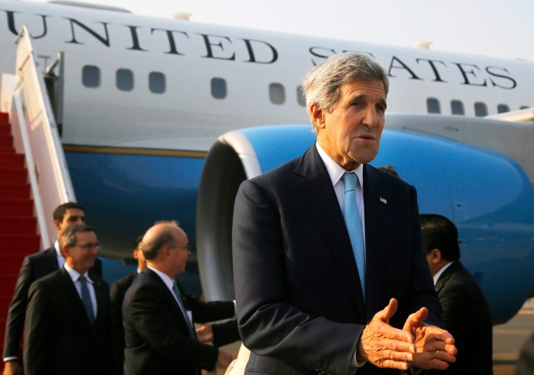 U.S. Secretary of State John Kerry arrives at the airport in Jakarta, Indonesia, on Monday Oct. 20, 2014, for the inauguration of new Indonesian President Joko 