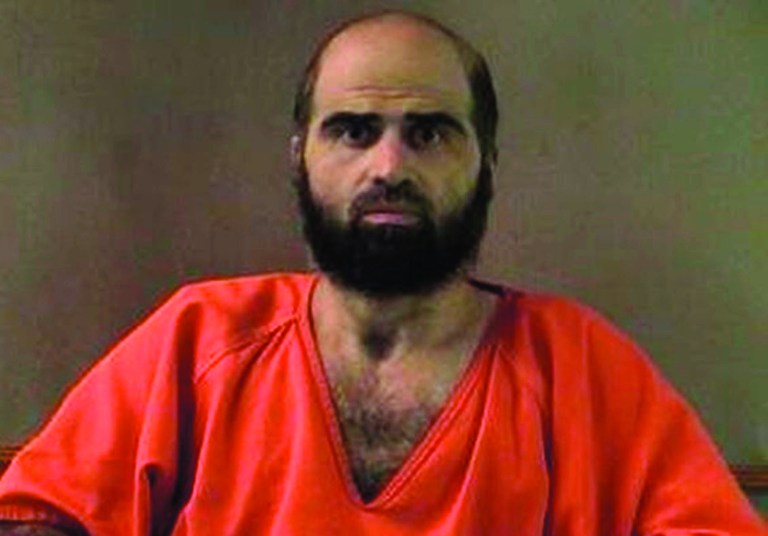 FILE - This undated file photo provided by the Bell County Sheriff's Department via The Temple Daily Telegram shows Nidal Hasan. The trial for the Army psychiatrist charged in the deadly 2009 Fort Hood shooting was put on hold Wednesday, Aug. 15, 2012, while an appeals court considers his objections to being forcibly shaved. (AP Photo/Bell County Sheriff's Department via The Temple Daily Telegram, File)