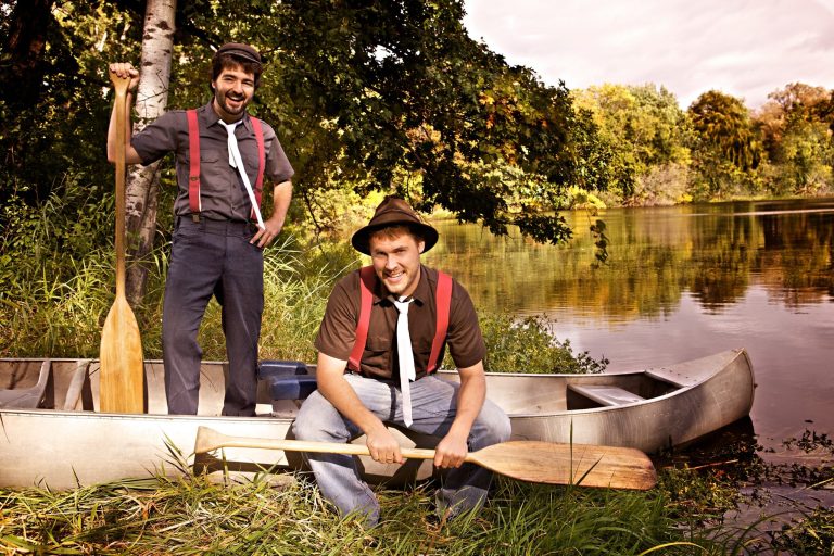   In this 2011 photo provided courtesy of Alex Johnson, the Okee Dokee Brothers, Joe Mailander, right, and Justin Lansing pose for a photo along the Mississippi River. The Minneapolis duo has been nominated for a Grammy Award for best children's album. (AP Photo/Courtesy of Alex Johnson)  