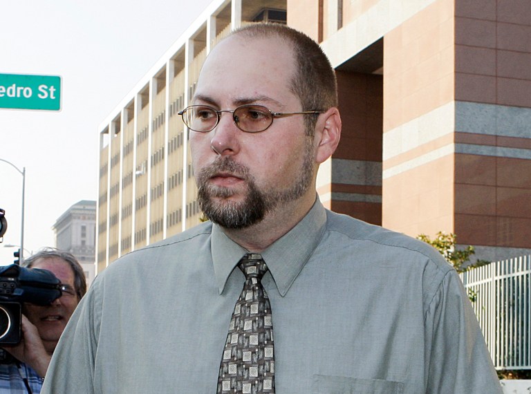   FILE - In this Nov. 1, 2011 file photo, Christopher Chaney, 35, of Jacksonville, Fla., leaves federal court in Los Angeles. Chaney has agreed to plead guilty to hacking into the email accounts of celebrities such as Christina Aguilera, Mila Kunis and Scarlett Johansson, whose nude photos eventually landed on the Internet, according to court documents filed Thursday, March 22, 2012. Long before Christopher Chaney made headlines by hacking into the email accounts of such stars as Scarlett Johansson and Christina Aguilera, he honed his craft at the expense of two women who say he harassed them and stalked them online. (AP Photo/Reed Saxon, File)  