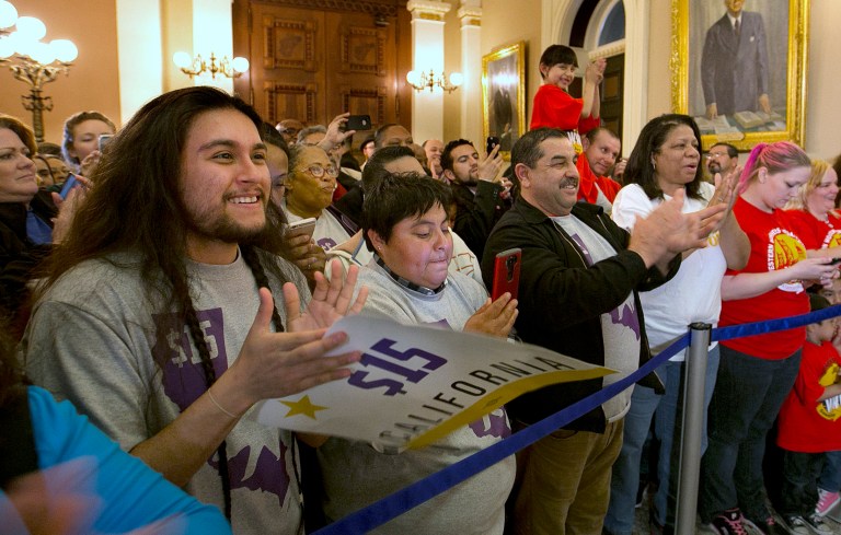 The legislation allows the governor to freeze the rate if the California economy gets worse. (AP Photo/Rich Pedroncelli)