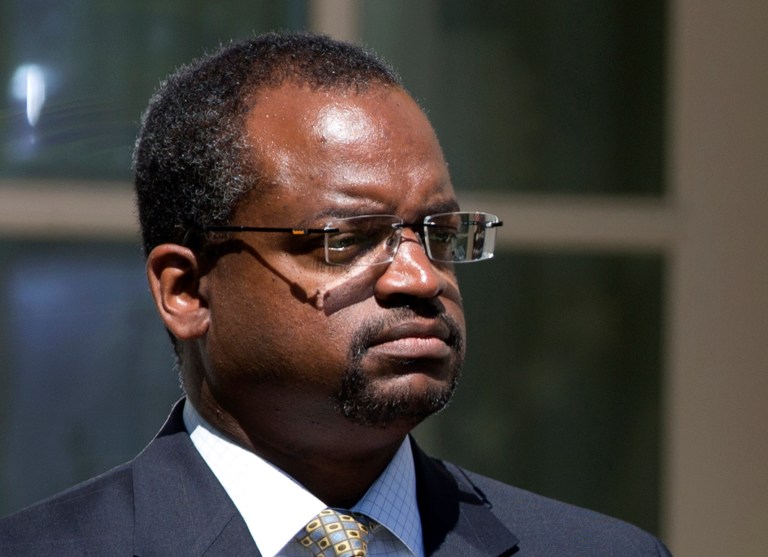 FILE - In this June 3, 2013 file photo, Robert Wilkins, President Barack Obama's nominee to the District of Columbia Circuit Court, listens in the Rose Garden of the White House in Washington. The Senate confirmed Wilkins to the U.S. Court of Appeals for the District of Columbia on Monday, Jan. 13, 2014.  (AP Photo/Manuel Balce Ceneta, File)