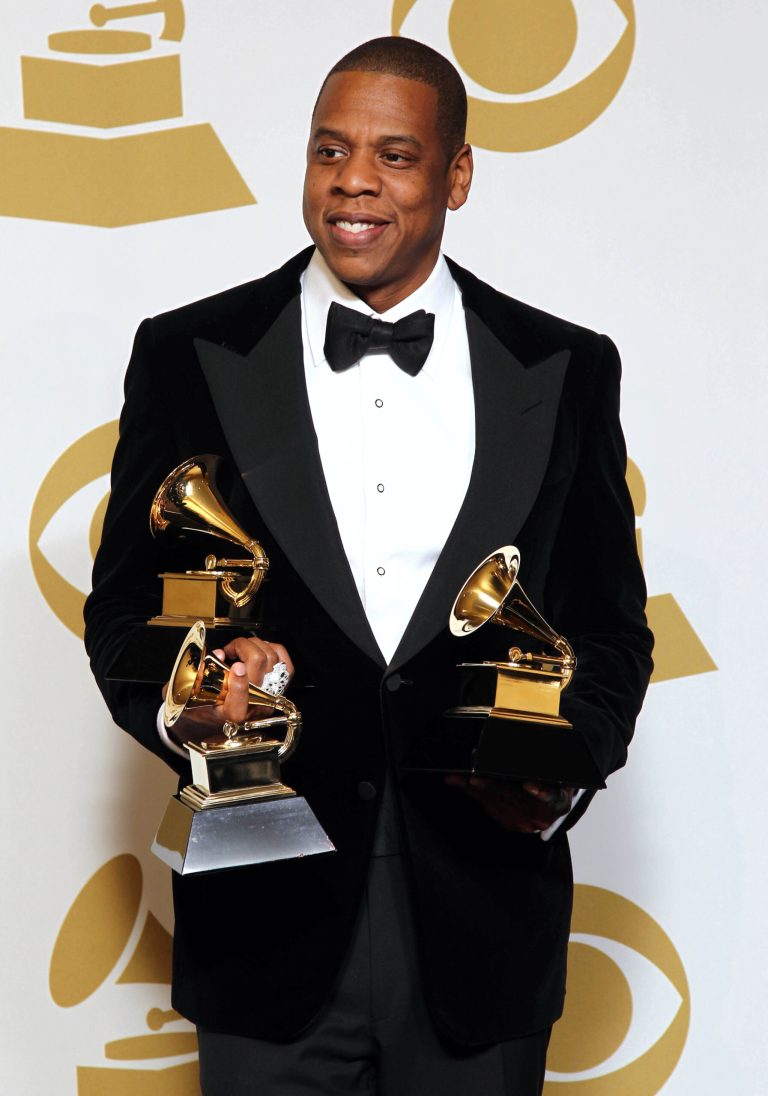 FILE - In this Feb. 10, 2013 file photo, Jay-Z poses backstage with the awards for best rap/sung collaboration for 