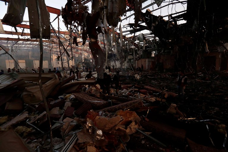 Yemeni security and medical officials say at least 45 people have been killed in a Saudi-led coalition airstrike that targeted a funeral hall in the capital, Sanaa. (AP Photo/Osamah Abdulrhman)