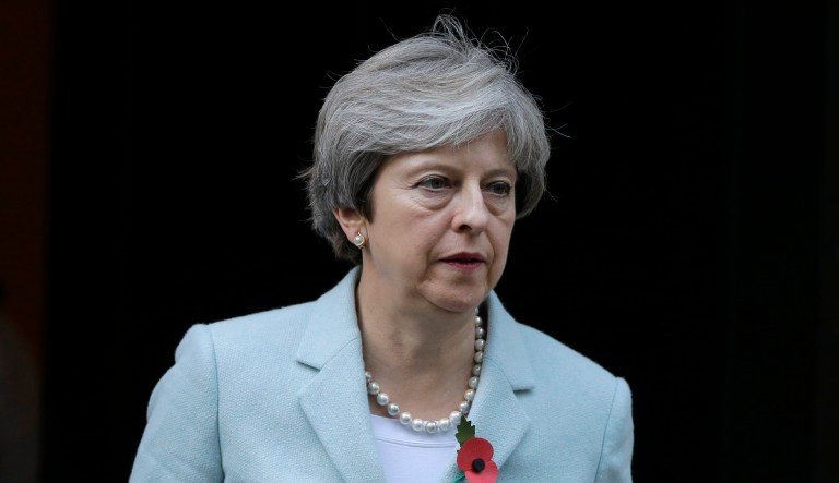 May's opposition to the historic decision comes at a time of great tension between the British government and Trump administration. (AP Photo/Alastair Grant)
