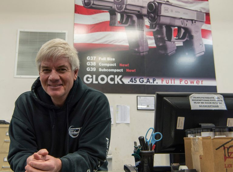 Ed Turner, owner of Ed's Public Safety gun shop in Stockbridge, Ga. (AP Photo/Lisa Marie Pane)