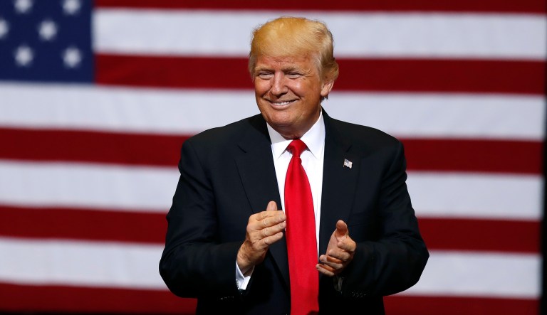 President Trump congratulated his eldest son Donald Trump Jr. for how he carried himself during a Tuesday interview about his role in a July 2016 meeting with a Russian government-affiliated attorney. (AP Photo/Charlie Neibergall)