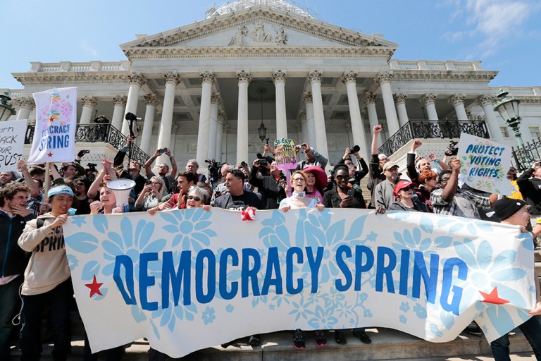 Voting rights reform demonstrators stage a sit-in at the Capitol in Washington, Monday, April 11, 2016, urging lawmakers to take money out of the political process. (AP Photo/J. Scott Applewhite)
