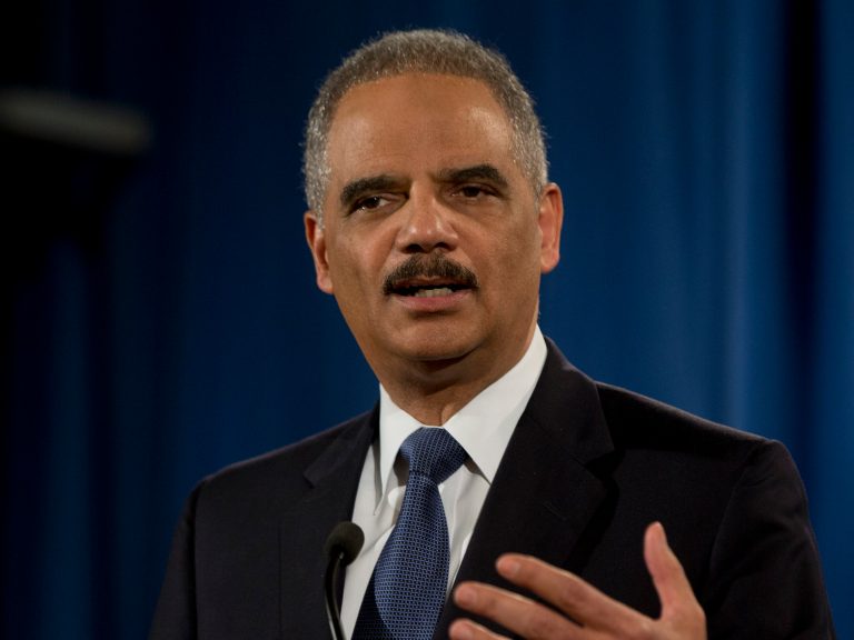 Former Attorney General Eric Holder, who will campaign for Hillary Clinton in South Carolina ahead of Sunday's debate in Charleston, praised her plans to tackle a wide range of issues, such as gun control and college affordability. (AP Photo/Carolyn Kaster)