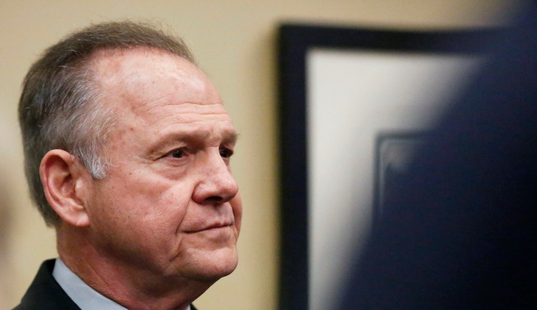 Four of the five Senate members who had previously endorsed Moore's campaign had revoked their support by Monday night. (AP Photo/Brynn Anderson)