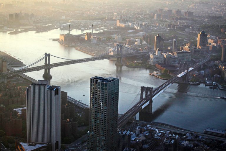 Seven months after Superstorm Sandy swamped New York, Mayor Michael Bloomberg proposed a nearly $20 billion plan to protect the city from the effects of global warming and storms. (AP photo/Mark Lennihan, File)