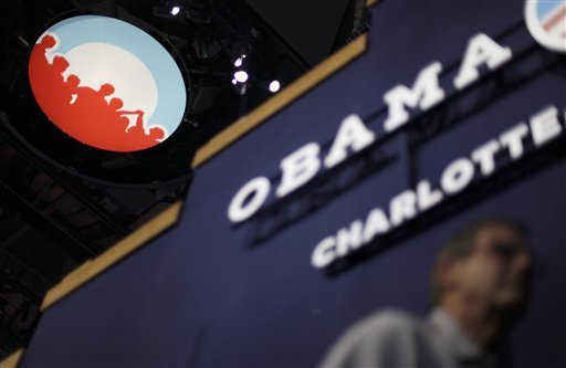 Obama campaign logo is seen under the scoreboard hanging from the ceiling inside of Time Warner Cable Arena in Charlotte, N.C. (AP Photo)