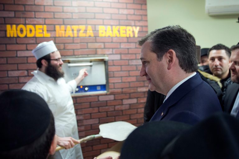 Republican presidential candidate, Sen. Ted Cruz, R-Texas, watches as matzah he helped make is readied to be baked at the Chabad Neshama Center during a campaign event, Thursday, April 7, 2016, in New York. (AP Photo/Mary Altaffer)