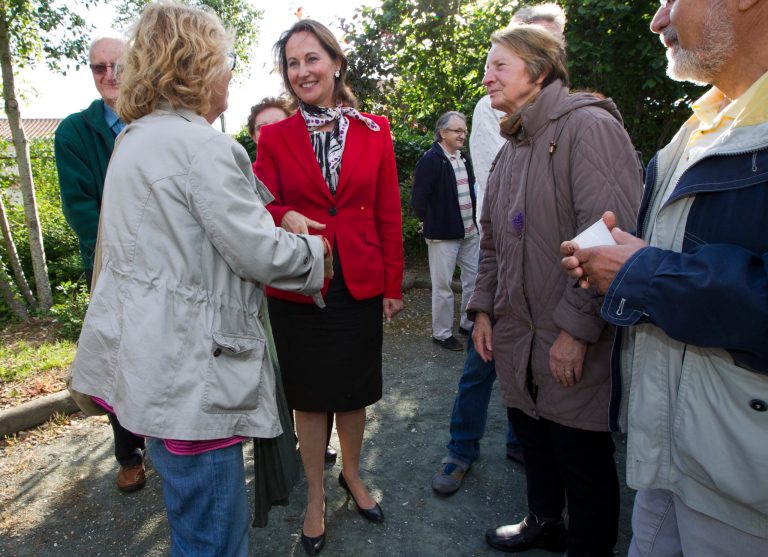   French former Socialist presidential candidate Segolene Royal, center, campaigns in La Rochelle, western France, Saturday, June 16, 2012. Royal is facing a Socialist Party opponent in the second round election next Sunday. (AP Photo/Yohan Bonnet)  