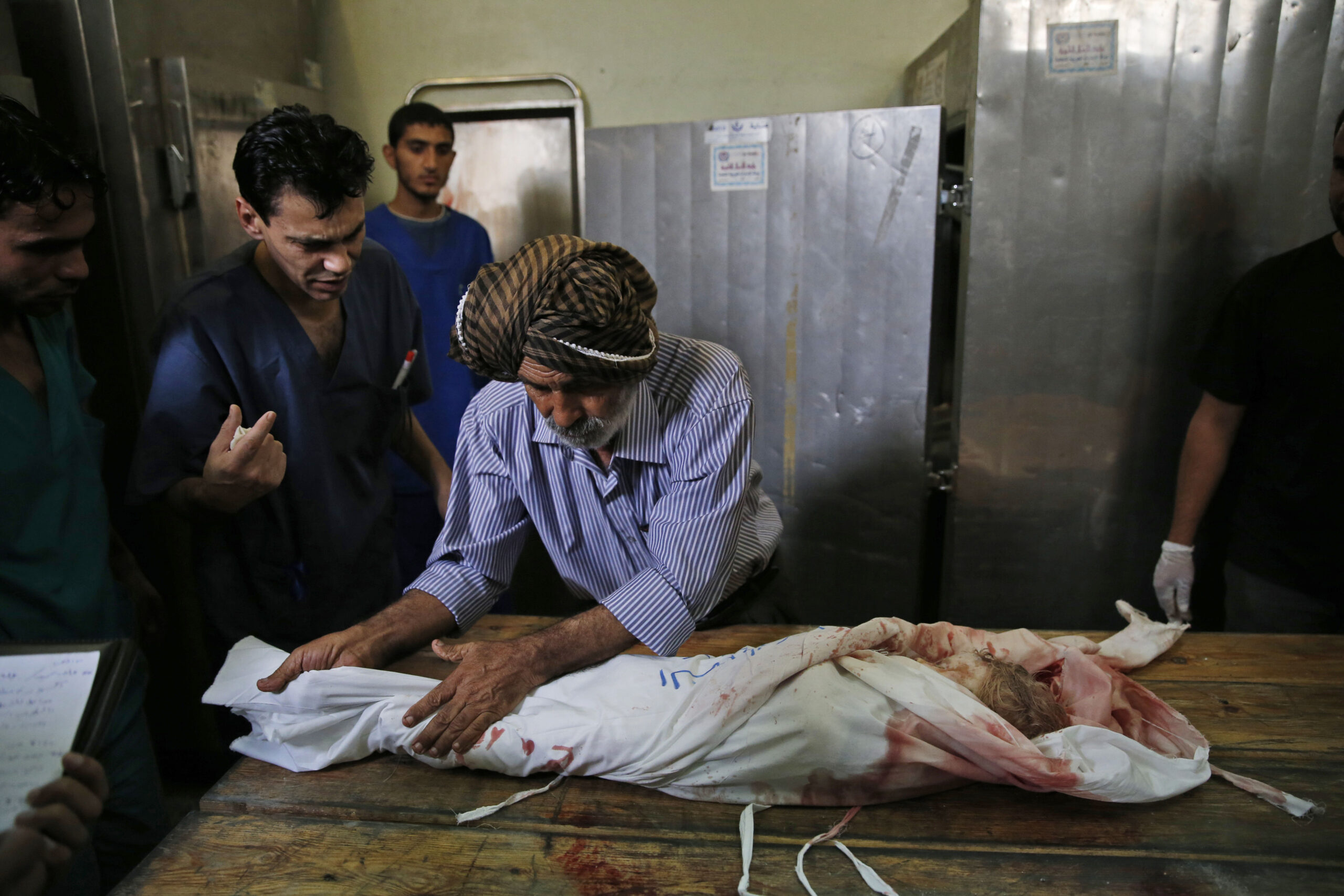 Busy Gaza morgue performs Muslim burial rituals