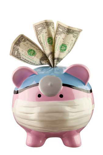 Businesses are boosting employee payments through higher insurance premiums and doctor visit co-pays in advance the health reform law's rules taking effect Jan. 1.